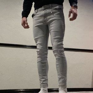 White ripped denim jeans